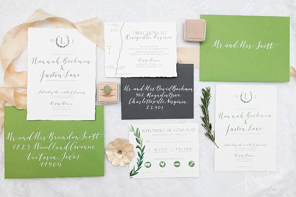 Green watercolor monogram crest, leaves and calligraphy wedding invitation suite by Farmstead Design Studio featuring Madeline Stuart Charlottesville Wedding Styled Shoot - www.homeonthefarmstead.com - calligraphy Simply Handwritten by Anna - Lieb Photographic